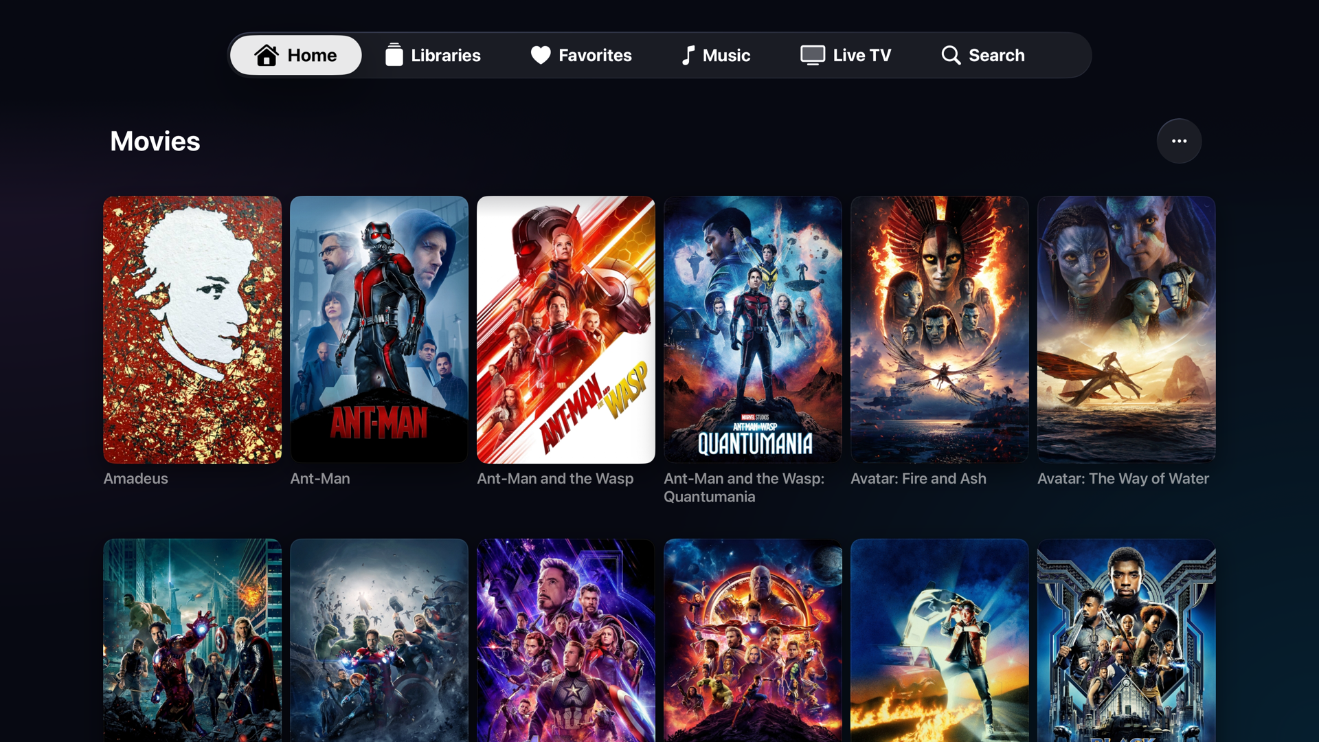 NaviFin library grid on Apple TV showing poster art across the collection.